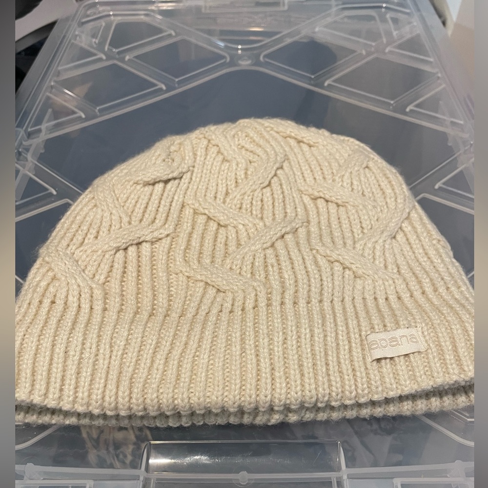 Cream colored Abana Sherpa lined knit cap